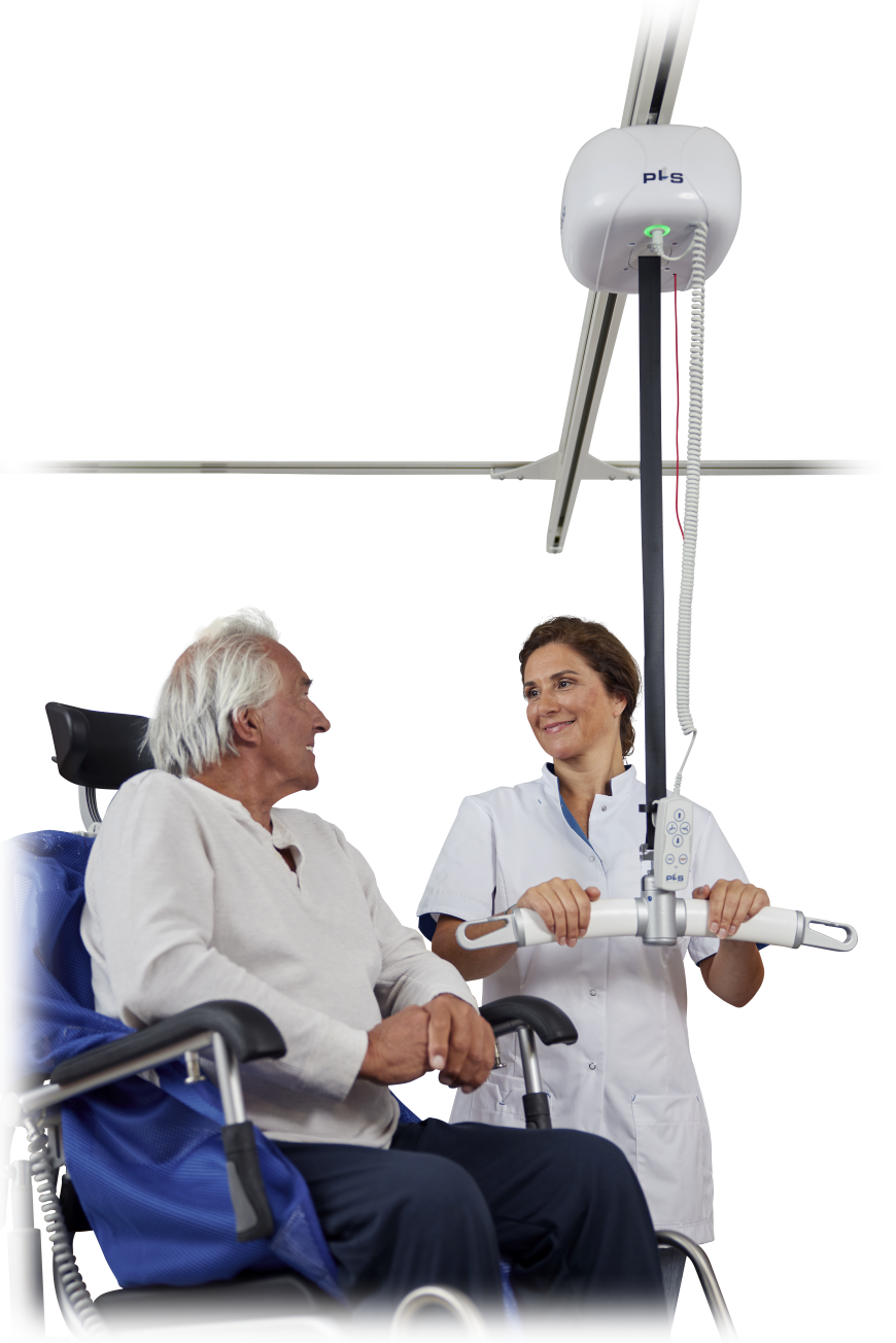 Caregiver under PLS ceiling lift looking at man in wheelchair